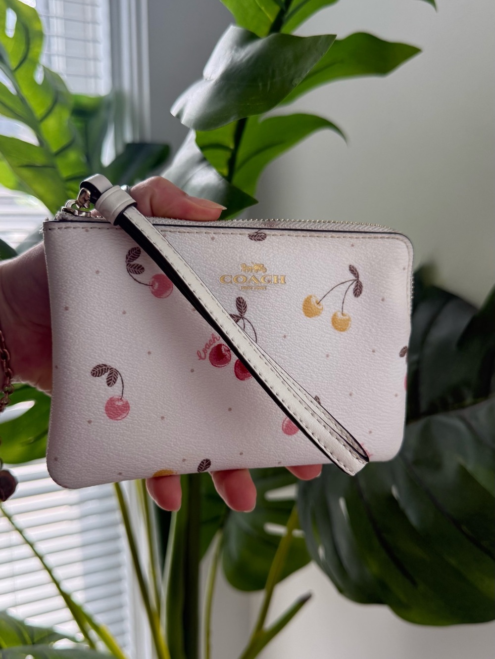 Coach White Cherry Print Wristlet with Gold Logo